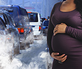 Pregnant woman exposed to pollution from traffic