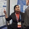 Aswani Unnikrishnan explaining a poster at SOT 2024