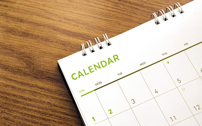 Calendar on wooden table