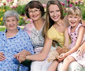 photo of four females of different ages and generations