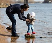 Mother and child on the bank of the river